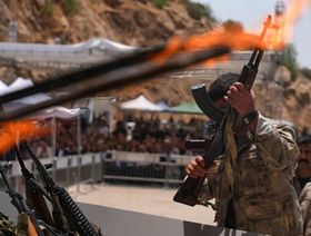 بالصور.. مقاتلو حزب العمال الكردستاني يبدأون تسليماً رمزياً لأسلحتهم في العراق