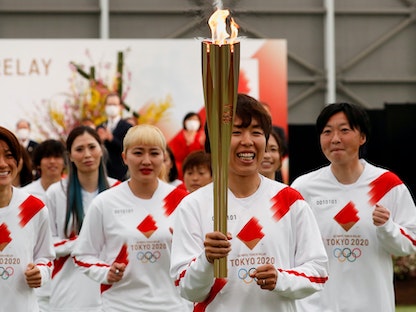 مسيرة الشعلة الأولمبية "طوكيو 2020" - REUTERS