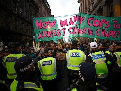 احتجاجات في مدينة جلاسكو الاسكتلندية بالتزامن مع اجتماعات قمة الأمم المتحدة للمناخ - REUTERS