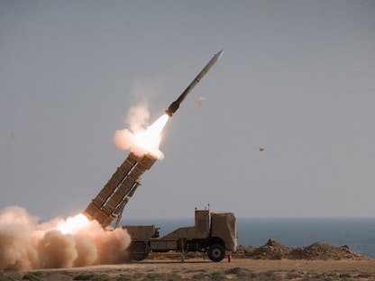 جانب من عملية إطلاق أحد الصواريخ الإيرانية خلال تمرين عسكري - 7 نوفمبر 2022 - via REUTERS