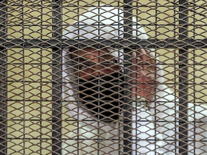 رجل الأعمال المصري محمد الأمين خلال إحدى جلسات محاكمته، القاهرة، مصر-20 مارس 2022 - AFP