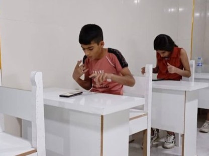 فريق الأطفال السوري أثناء مشاركته في مسابقة الأولمبياد العالمي للحساب الذهني. - سانا