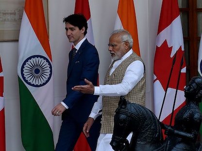رئيس الوزراء الهندي ناريندرا مودي يستقبل نظيره الكندي جاستن ترودو في نيودلهي. 23 فبراير 2018 - AFP