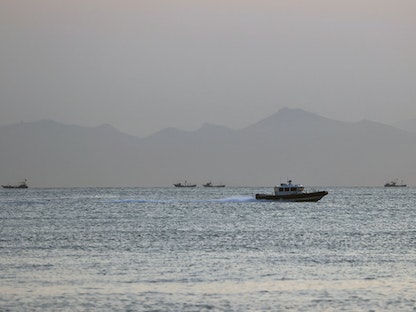 سفينة تايوانية تمر عبر ساحل الصين قبالة جزيرة نانجان في أرخبيل ماتسو بتايوان، 16 أغسطس 2022 - REUTERS