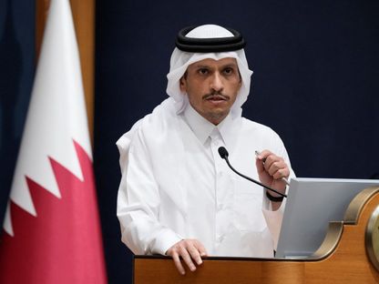 رئيس الوزراء وزير الخارجية القطري الشيخ محمد بن عبد الرحمن آل ثاني خلال مؤتمر صحافي في الدوحة. 13 أكتوبر 2023 - Reuters