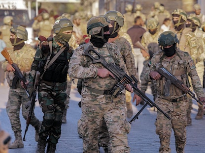 فصائل سورية مدعومة من تركيا خلال عرض عسكري شمالي حلب - 9 سبتمبر 2021 - AFP