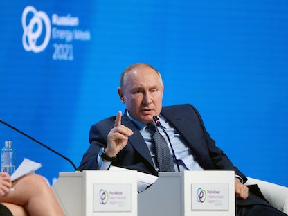 الرئيس الروسي فلاديمير بوتين خلال منتدى الطاقة في موسكو - 13 أكتوبر 2021 - via REUTERS