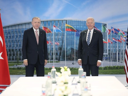 الرئيس التركي رجب طيب أردوغان يلتقي بالرئيس الأميركي جو بايدن على هامش قمة الناتو في بروكسل - 14 يونيو 2021 - REUTERS
