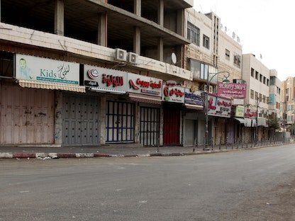 صورة أرشيفية لأحد الشوارع الخالية في فلسطين خلال إضراب سابق - وكالة الأنباء الفلسطينية
