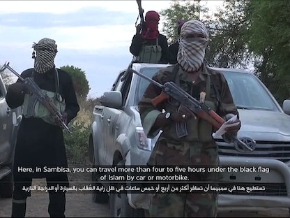 مسلحون من جماعة "بوكو حرام" في نيجيريا بتسجيل مصور -  2 يونيو 2015  - AFP