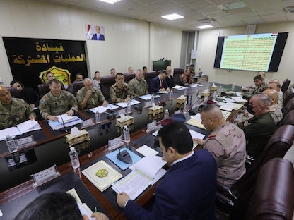 جانب من الاجتماع بين اللجنة الفنية العسكرية العراقية ونظيرتها الأميركية في العراق - واع