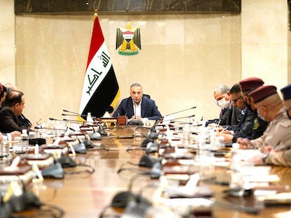 رئيس الوزراء العراقي مصطفى الكاظمي يرأس اجتماعاً أمنياً في بغداد بعد محاولة اغتياله. 7 نوفمبر 2021 - AFP