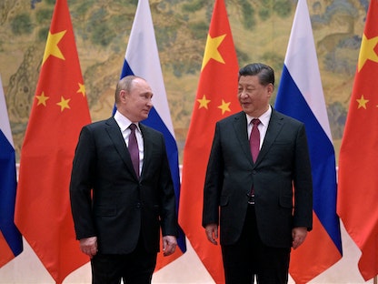 الرئيس الروسي فلاديمير بين يلتقي نظيره الصين شي جين بينج في بكين- 4 فبراير 2022 - via REUTERS