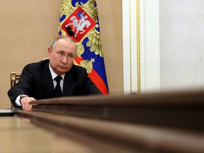 الرئيس الروسي فلاديمير بوتين يحضر اجتماعاً حكومياً عبر الفيديو، موسكو- 10 مارس 2022 - via REUTERS