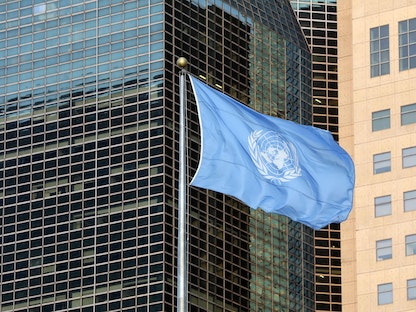 (FILES) In this file photo the United Nations flag is seen is seen during the Climate Action Summit 2019 at the United Nations General Assembly Hall September 23, 2019 in New York City. - UN Secretary-General Antonio Guterres and British Prime Minister Boris Johnson will host a closed-door meeting of world leaders at the sidelines of the General Assembly in New York on September 20, 2021 to boost climate commitments. The roundtable comes less than six weeks before a major UN climate meeting, COP26, in Glasgow, aimed at ensuring the world meets its goal of holding century-end warming to 1.5 degrees Celsius. (Photo by Ludovic MARIN / AFP) - AFP