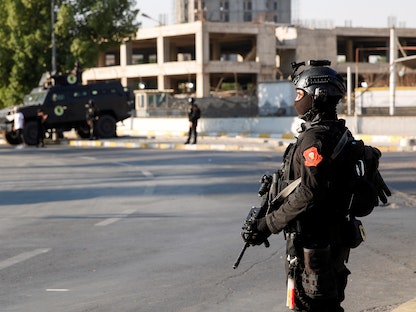 عناصر من قوات الأمن العراقية خلال تنفيذ الإجراءات الأمنية قبل قمة بغداد في بغداد، العراق، 28 أغسطس 2021 - REUTERS