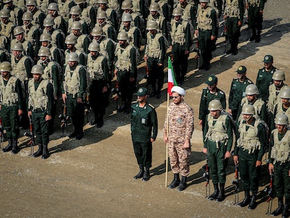 قوات من الحرس الثوري الإيراني تشارك في مناورة عسكرية للقوات البرية للحرس الثوري الإيراني في منطقة أراس بمحافظة أذربيجان الشرقية في إيران. 17 أكتوبر 2022 - via REUTERS