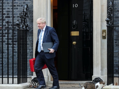 British PM Boris Johnson in Downing Street - REUTERS