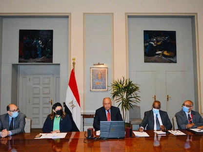 وزير الخارجية المصري سامح شكري خلال المؤتمر الافتراضي بشأن ليبيا. 30.سبتمبر 2021 - وزارة الخارجية المصرية
