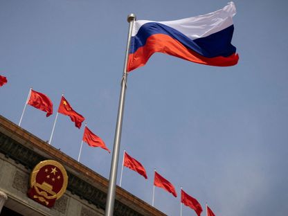 العلم الروسي يرفرف أمام قاعة الشعب الكبرى في بكين. 24 مايو 2023 - REUTERS