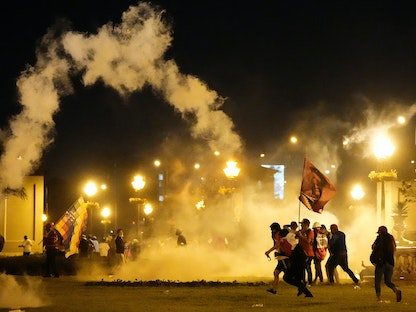 جانب من المواجهات بين الشرطة والمتظاهرين في ليما، بيرو- 20 يناير 2023 - REUTERS