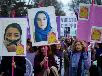 مسيرة للاحتفال باليوم العالمي للمرأة في العاصمة الإسبانية مدريد. 8 مارس 2023 - REUTERS
