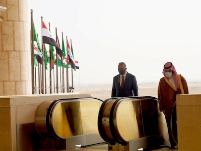 ولي العهد السعودي الأمير محمد بن سلمان خلال استقباله رئيس الوزراء العراقي مصطفي الكاظمي في الرياض - 31 مارس 2021 - REUTERS