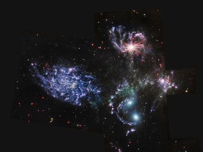 صورة التقطها تلسكوب جيمس ويب وكشفت عنها وكالة ناسا في 12 يوليو 2022 لخماسية ستيفان وهو مجموعة مرئية من 5 مجرات في ضوء جديد - AFP