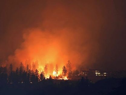 حريق غابات ماكدوجال كريك ويست كيلونا بمقاطعة كولومبيا البريطانية في كندا. 19 أغسطس 2023 - Reuters