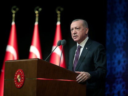 الرئيس التركي رجب طيب أردوغان يتحدث خلال اجتماع لكشف النقاب عن خطة العمل الخاصة بحقوق الإنسان في أنقرة. - REUTERS