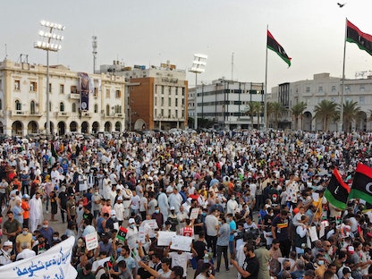 تظاهرة داعمة لحكومة الوحدة الوطنية الليبية في "ساحة الشهداء" بطرابلس - 24 سبتمبر 2021 - AFP