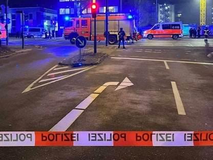 الشرطة الألمانية في موقع حادث إطلاق النار في حي ألستردورف بمدينة هامبورج. 9 مارس 2023 - Twitter