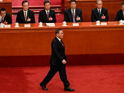 رئيس الوزراء الصيني المنتخب لي تشيانج خلال أداء القسم الدستوري - 11 مارس 2023 - AFP