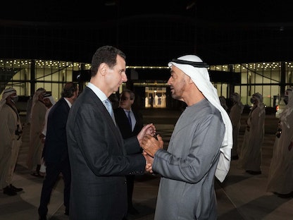 ولي عهد أبوظبي الشيخ محمد بن زايد والرئيس السوري بشار الأسد في أبوظبي، الإمارات العربية المتحدة- 18 مارس 2022. - الرئاسة السورية