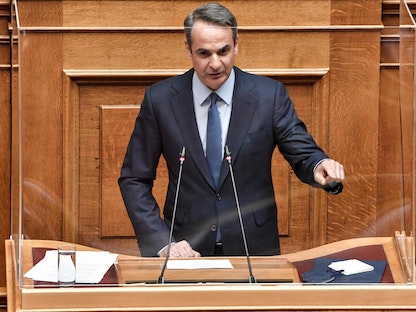 رئيس الوزراء اليوناني كيرياكوس ميتسوتاكيس في البرلمان اليوناني لمناقشة تعديل اتفاقية التعاون الدفاعي مع الولايات المتحدة - أثينا - 12 مايو 2022 - AFP