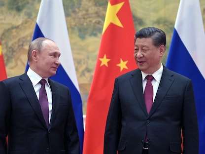 الرئيس الروسي خلال لقاءه نظيره الصيني شي جين بينج في بكين. 04 فبراير 2022. - AFP