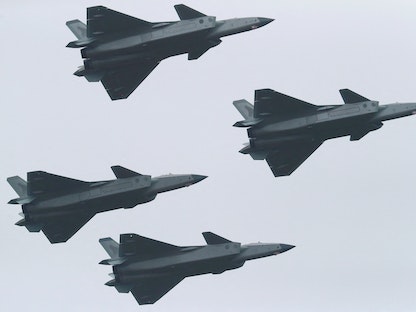 مقاتلات شبح صينية من طراز "J-20" خلال معرض الصين الدولي للطيران والفضاء في مقاطعة جوانجدونج. 8 نوفمبر 2022 - REUTERS