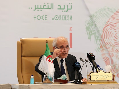 رئيس السلطة الوطنية للانتخابات في الجزائر محمد شرفي خلال مؤتمر صحافي للإعلان عن نتائج الانتخابات التشريعية - 15 يونيو 2021 - REUTERS