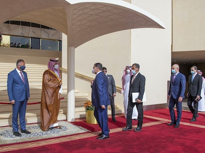 ولي العهد السعودي الأمير محمد بن سلمان ورئيس الوزراء العراقي مصطفى الكاظمي خلال زيارة الأخير للمملكة 31 مارس 2021 - AFP
