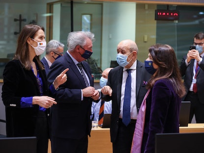 وزراء خارجية بلجيكا ولوكسمبورغ وفرنسا والسويد قبيل اجتماعهم مع نظرائهم في الاتحاد الأوروبي في بروكسل - 22 مارس 2021 - AFP