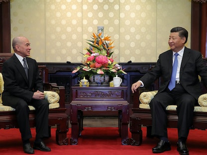 الرئيس الصيني شي جين بينج يلتقي بملك كمبوديا نورودوم سيهاموني في دار الضيافة، في بكين، الصين. 19 سبتمبر 2018 - REUTERS