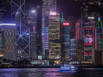 بنايات أمام ميناء فيكتوريا في هونغ كونغ - 1 يوليو 2021 - Bloomberg