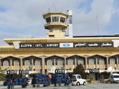 وصول مساعدات إلى مطار حلب الدولي للمتضررين من الزلزال. 7 فبراير 2023 - AFP