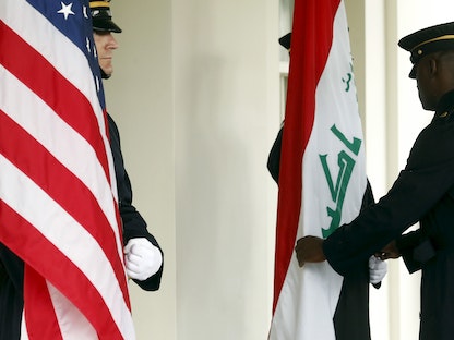 علما الولايات المتحدة والعراق في البيت الأبيض - REUTERS