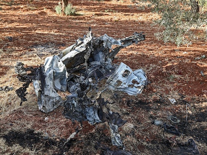 صورة تظهر حطام السيارة التي يعتقد أنه تم استهدافها بغارة أميركية في إدلب، سوريا، 20 سبتمبر 2021 - AFP