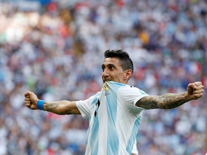 الأرجنتيني أنخيل دي ماريا يحتفل بعد تسجيله هدفاً لمنتخب بلاده في شباك فرنسا في الدور 16 لنهائيات كأس العالم 2018 - 30 يونيو 2018 - REUTERS