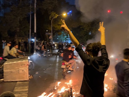 إيرانيون خلال مظاهرات ضد الحكومة في طهران- 19 سبتمبر 2019 - AFP