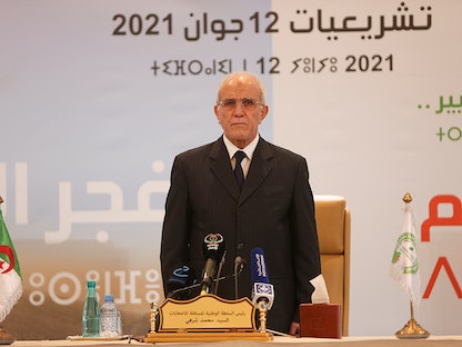 رئيس السلطة الوطنية للانتخابات في الجزائر محمد شرفي خلال مؤتمر صحافي للإعلان عن النتائج الأولية الانتخابات التشريعية 15 يونيو 2021 - REUTERS