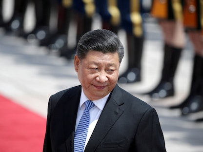 الرئيس الصيني شي جين بينج خارج قاعة الشعب الكبرى في بكين. الصين- 14 مايو  2019. - REUTERS