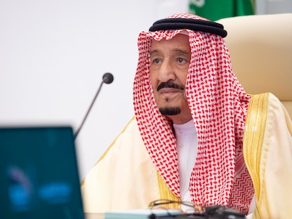 الملك سلمان بن عبد العزيز خلال قمة مجموعة الـ20 - 22 نوفمبر 2020 - via REUTERS